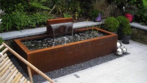 Pièce d'eau sur mesure en acier corten à Stoumont.